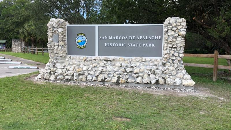 A new stone and wood entrance sign for the San Marcos de Apalache State Park 