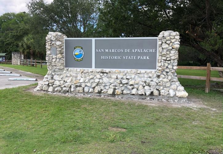 A new stone and wood entrance sign for the San Marcos de Apalache State Park 