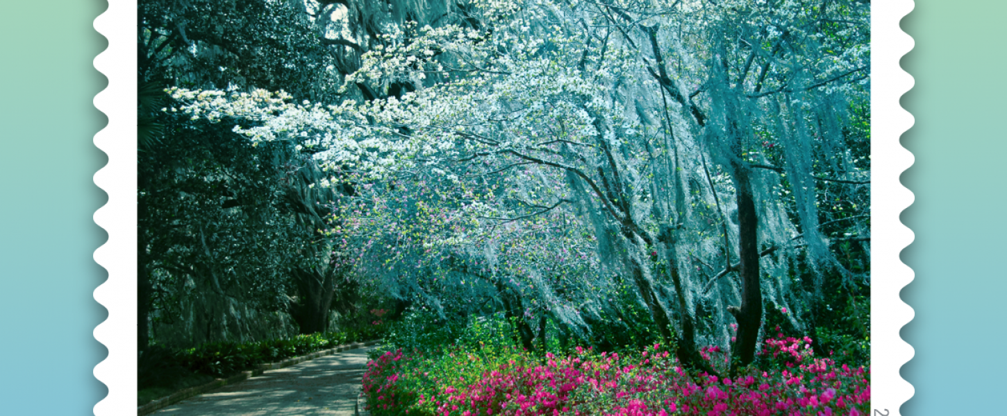 The stamp photograph shows a walkway with pink and white flowers at Maclay Gardens. 