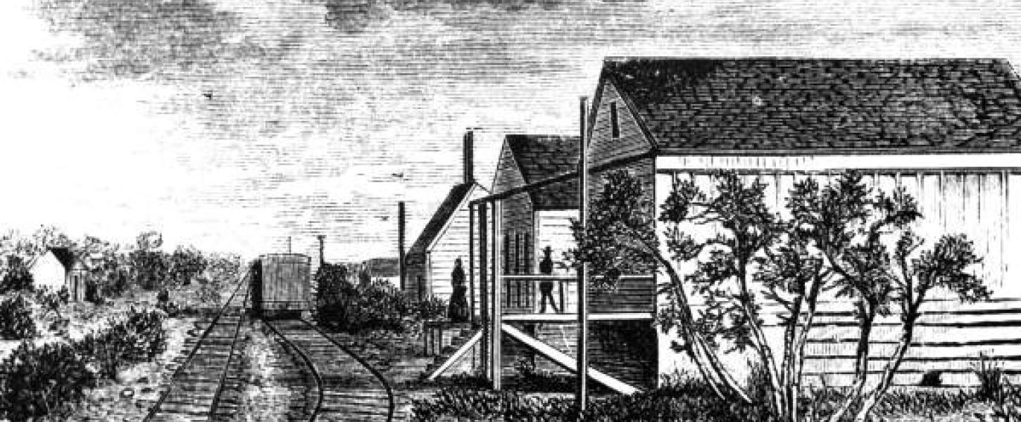 Historic black and white depiction of the historic st. marks railroad station. 