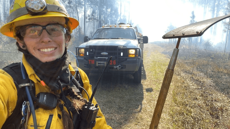Emily Reyes with prescribed fire equipment. 