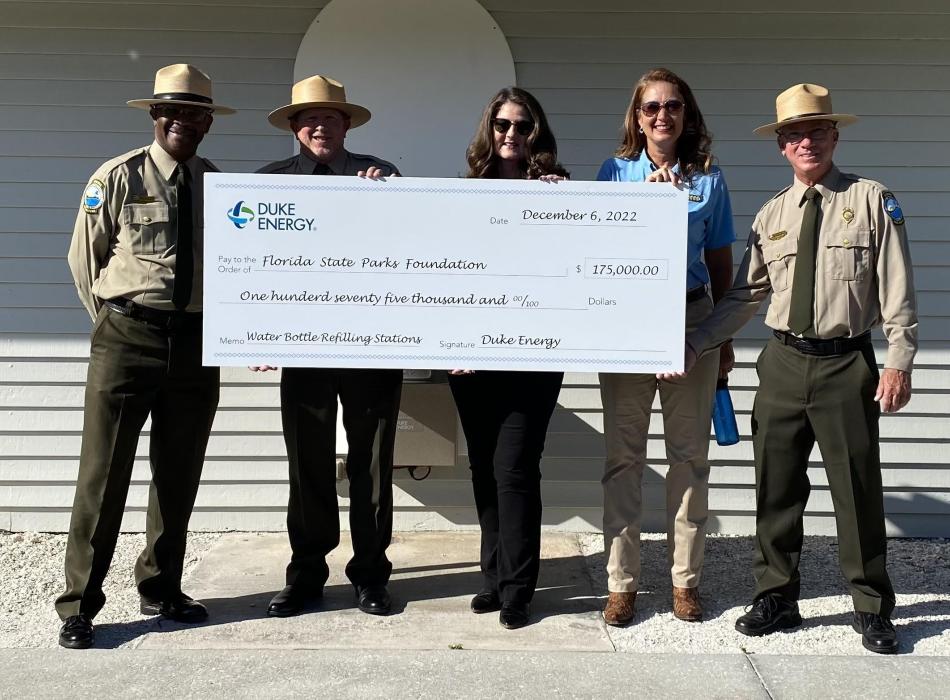 Duke Energy presented a check for $175,000 to help with the purchase and installation of 121 bottle refilling stations at 80 parks. 