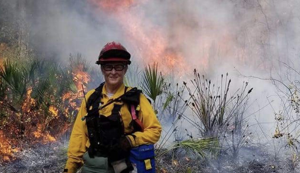 Elaine Fisher works on a prescribed fire.