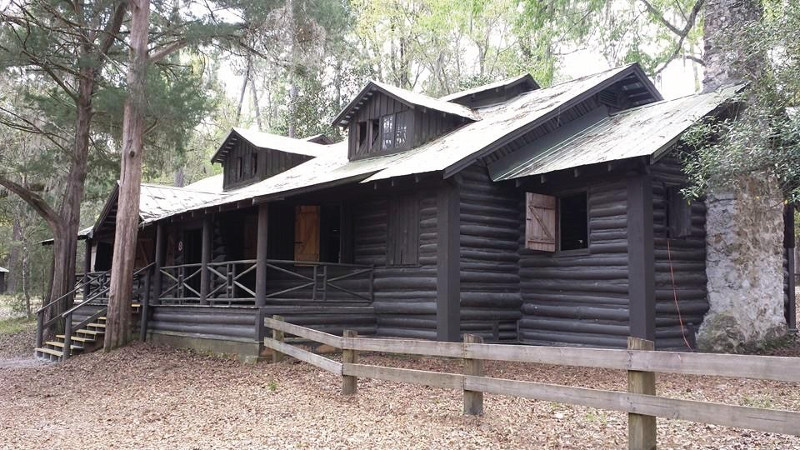 a large dark log cabin