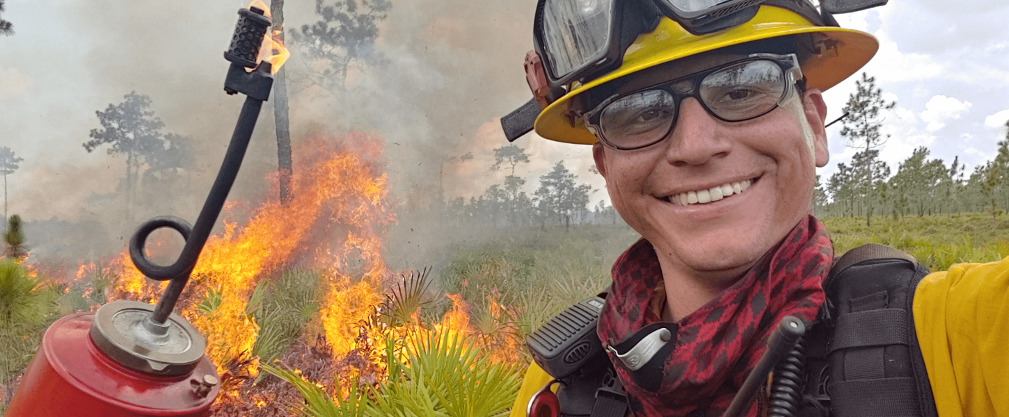 Christopher Carmago with prescribed fire equipment.