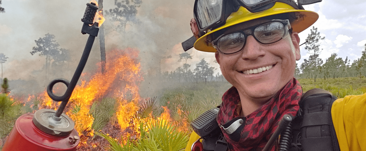 Christopher Carmago with prescribed fire equipment. 