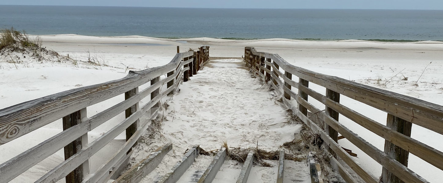The boardwalk near the fire station sustained damage and was covered by sand.  