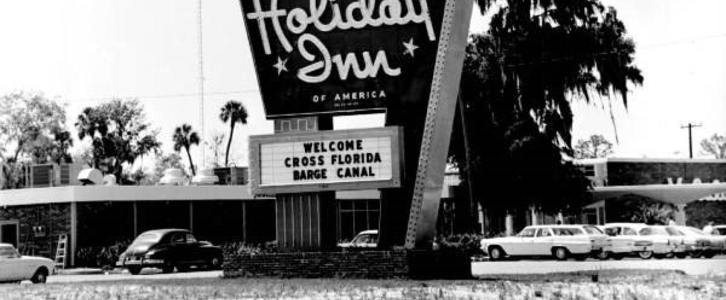 1967 Holiday Inn sign welcoming the Cross-Florida Barge Canal. Black and white image. 