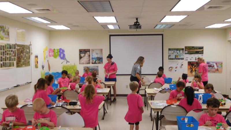 A classroom full of children participating in an activity.