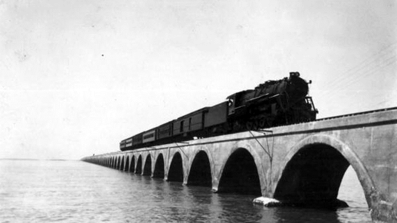 A train runs across the long key bridge