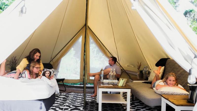 Family at glamping tent Lake Louisa