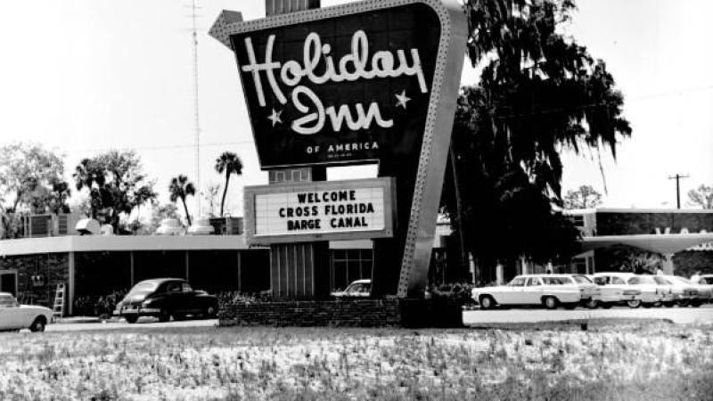 1967 Holiday Inn sign welcoming the Cross-Florida Barge Canal. Black and white image. 