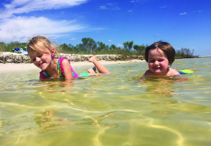 Children Swimming and playing in water