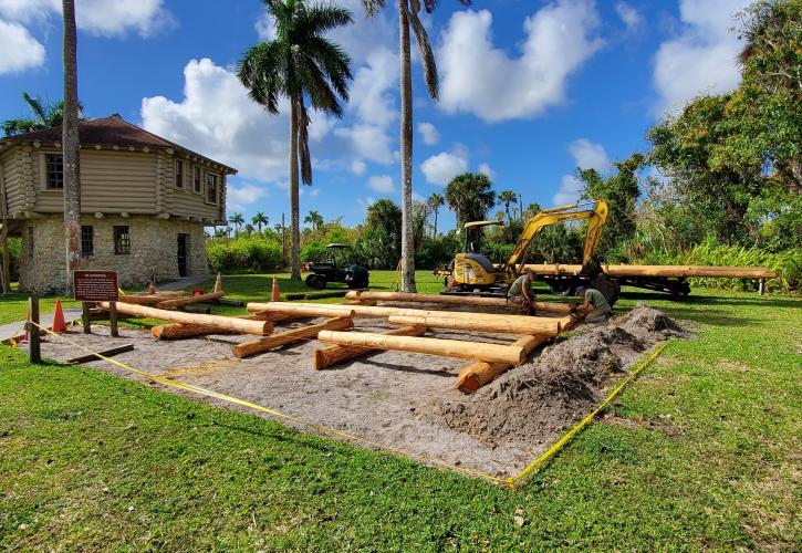 Log building and butterfly garden