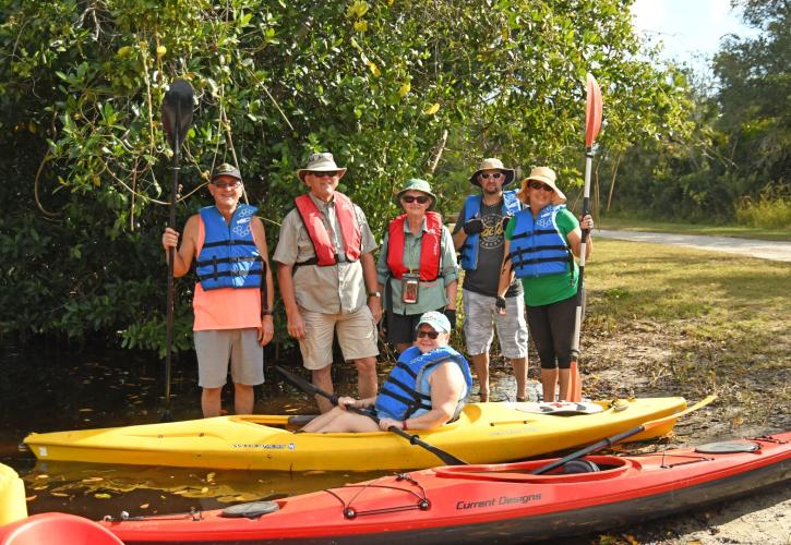 People and kayaks