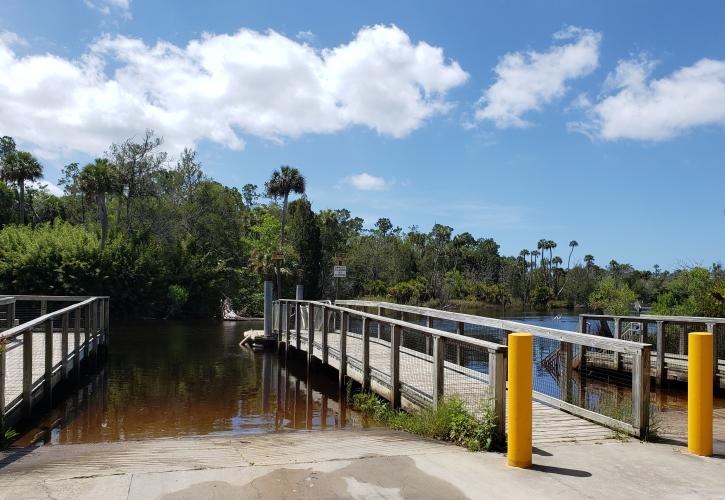 Two boat slips with boardwalks and boat tie-ups. 