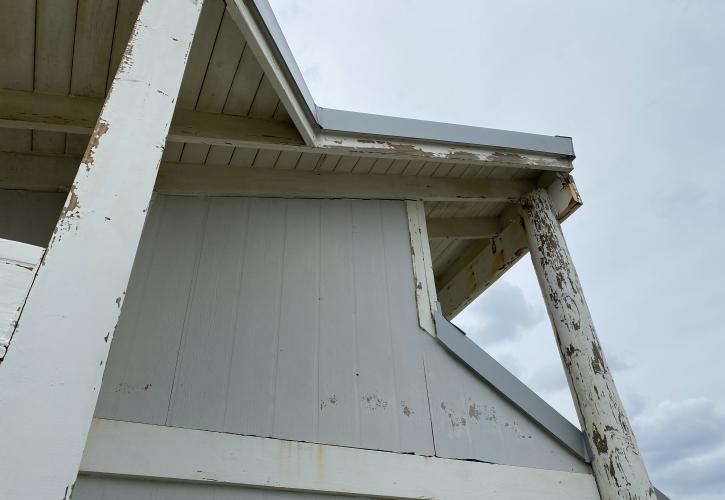The powerful winds and rain sandblasted the East End restroom and damaged the roof.  