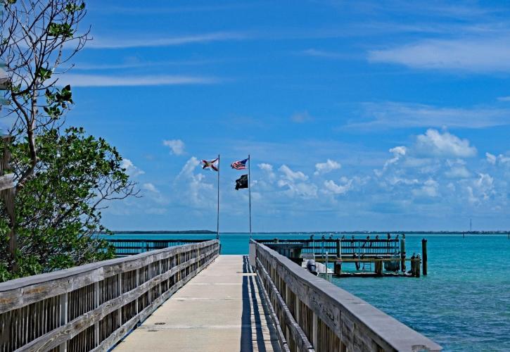 Turquoise blue water surrounds Lignumviate Key.  