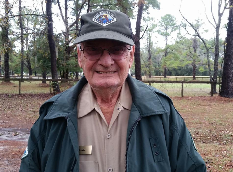 Volunteer Bill Lewis smiling at the camera