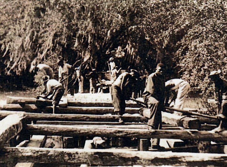 Civilian Conservation Corps workers building a bridge at Myakka River.