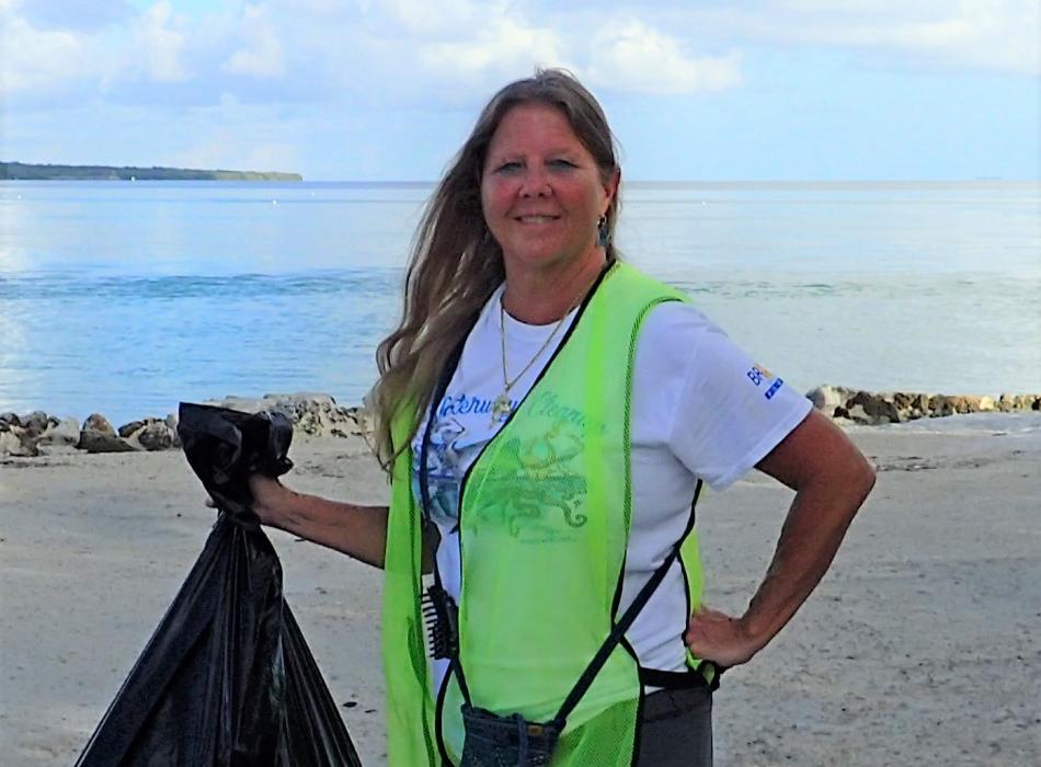 Jen Britt helps to collect trash at the annual cleanup event.