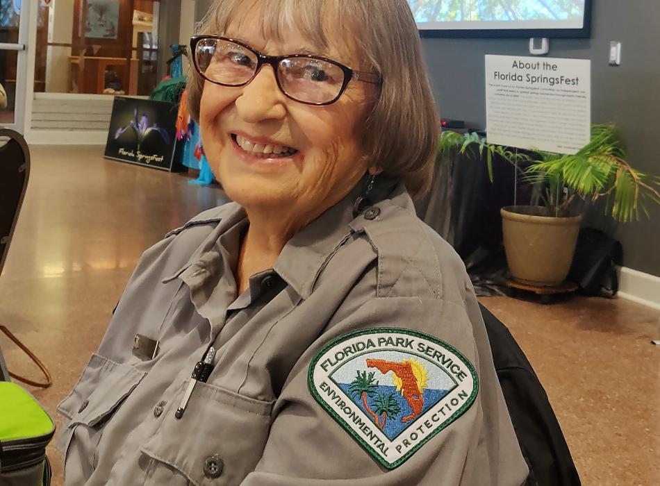 Volunteer Jodi Gregg smiling at the camera