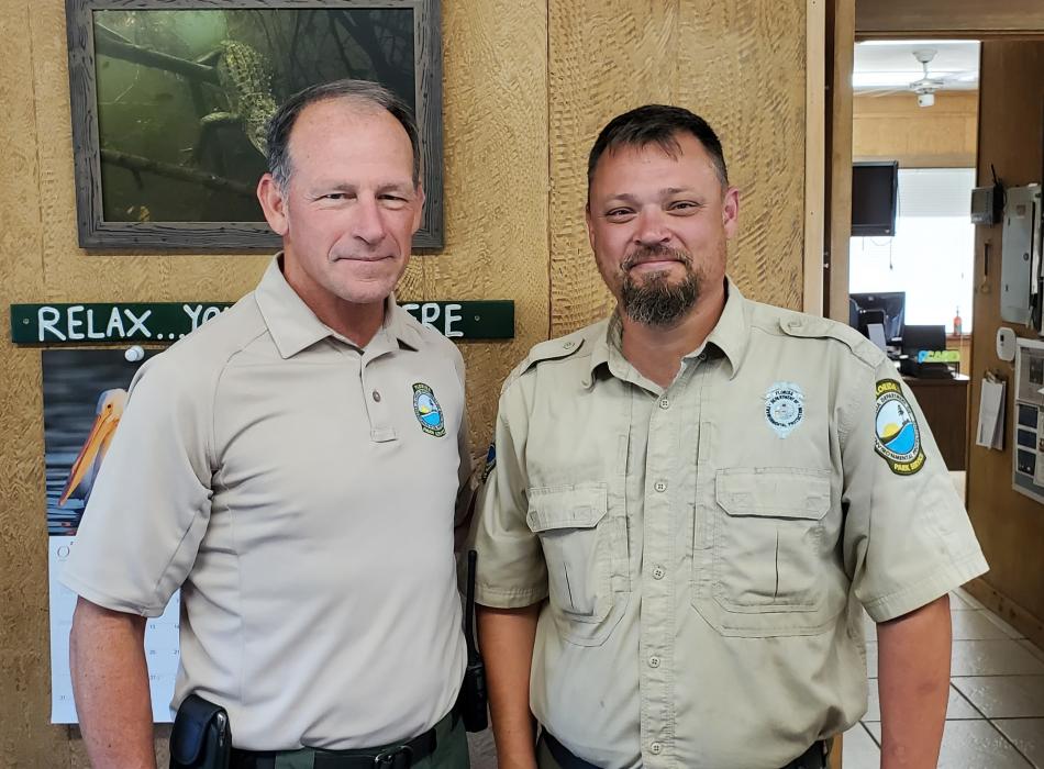 Park Rangers posing for photo in the ranger station