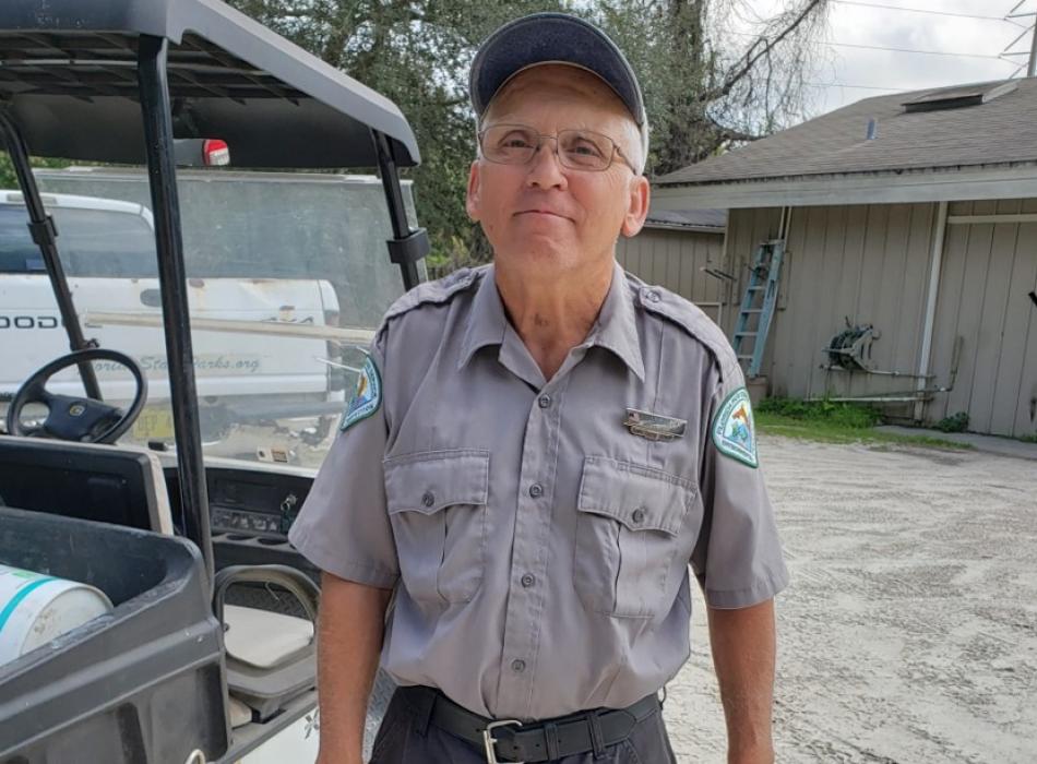 Volunteer Ronnie Coffman smiling at the camera