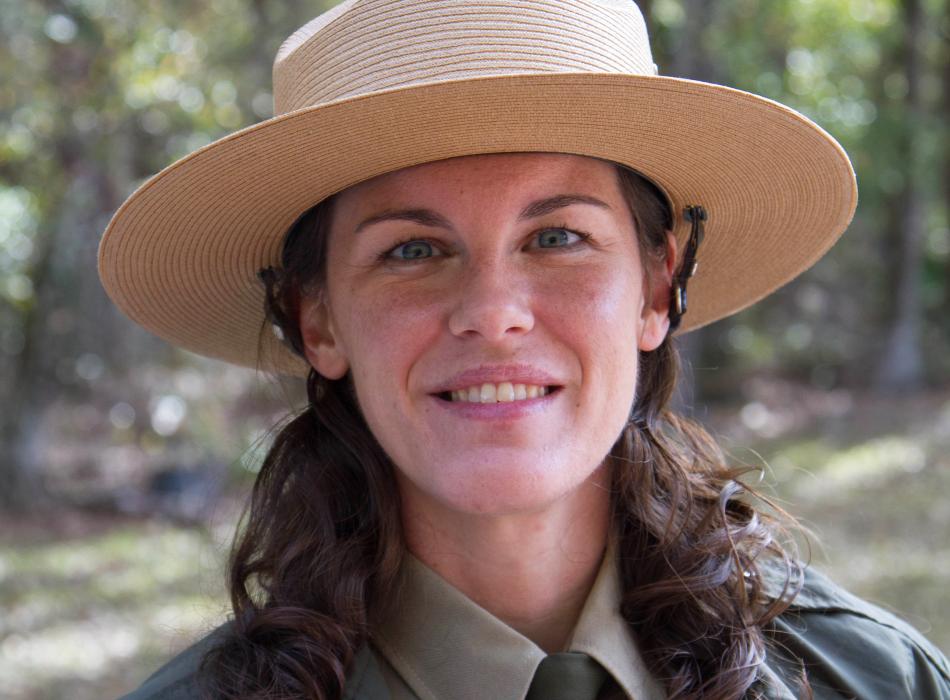 Laura McMullen, smiling at the camera.