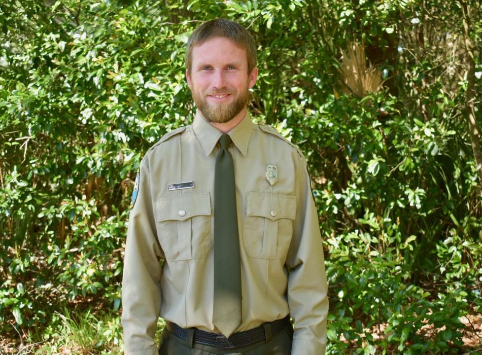 Park Services Specialist Ben Bandor smiling at the camera